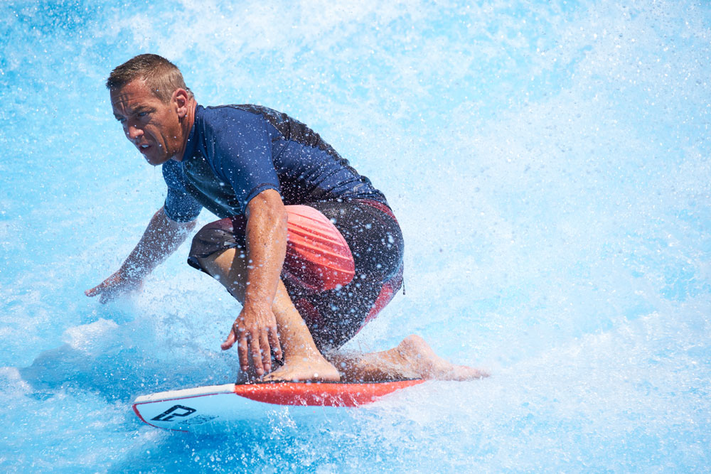 Man on water board at The Wave, Water World