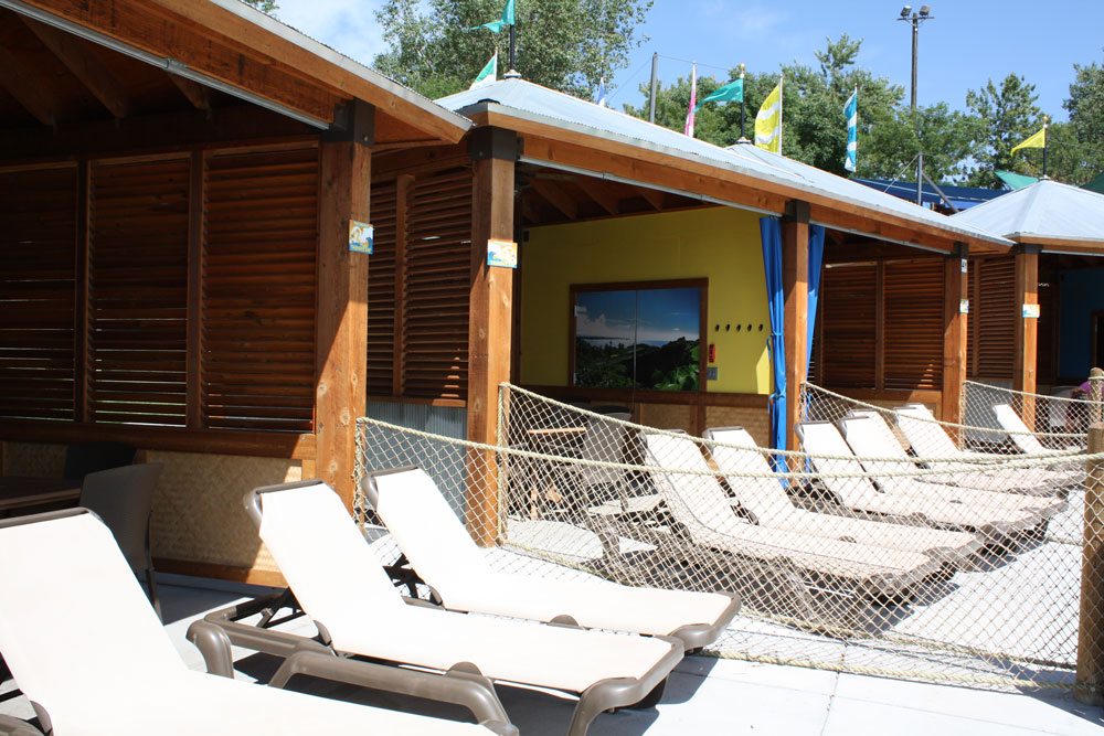 Outside view of the cabanas at Thunder Bay with sun chairs