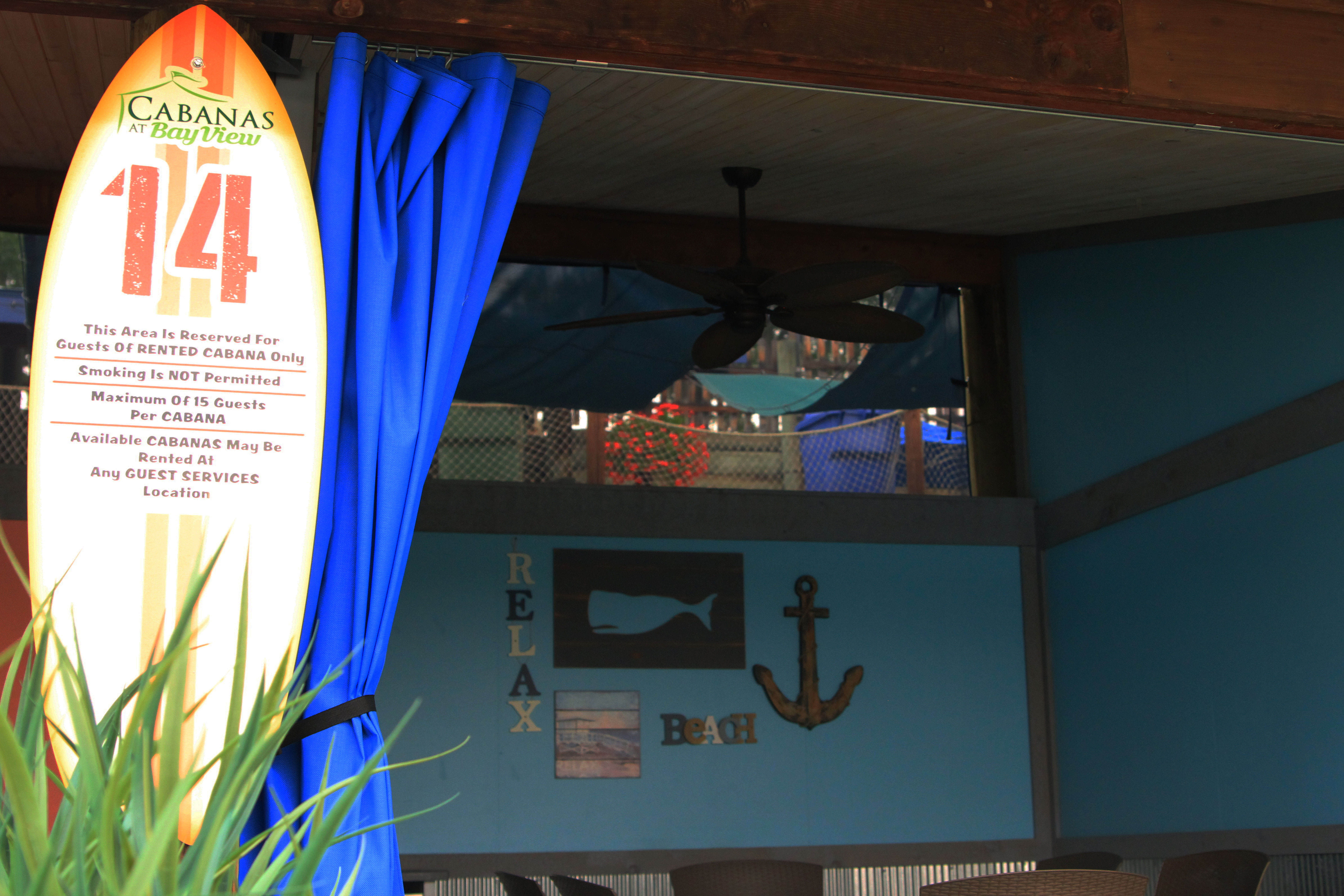 Inside view of a Cabana at Bay View with ceiling fan