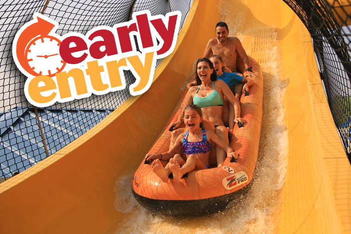 early-entry-img Family of four riding a large tube on an early entry water attraction