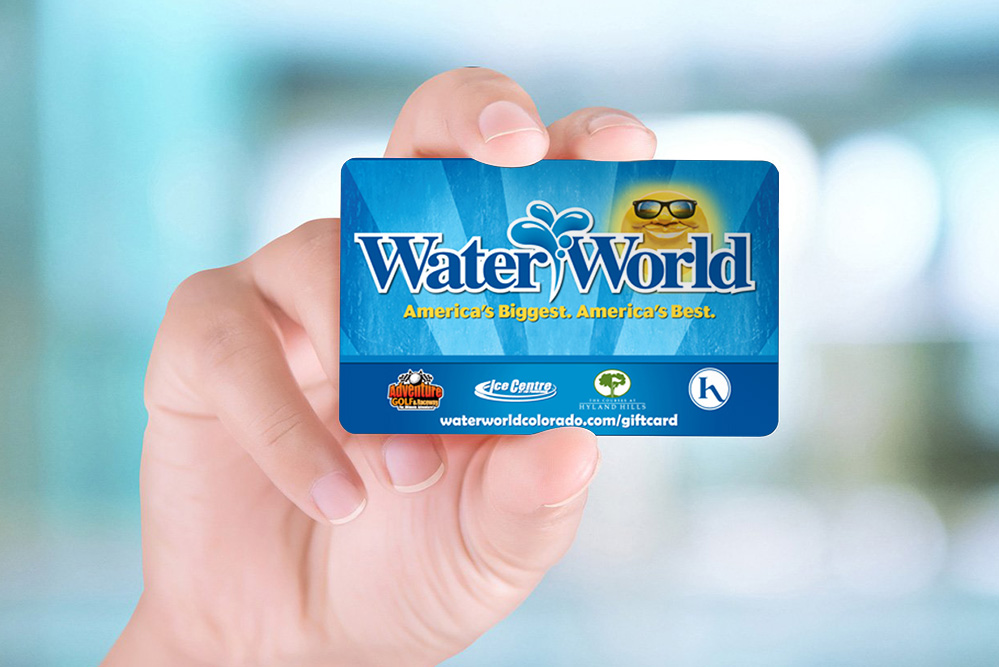 Woman hand holding Water World Gift Card
